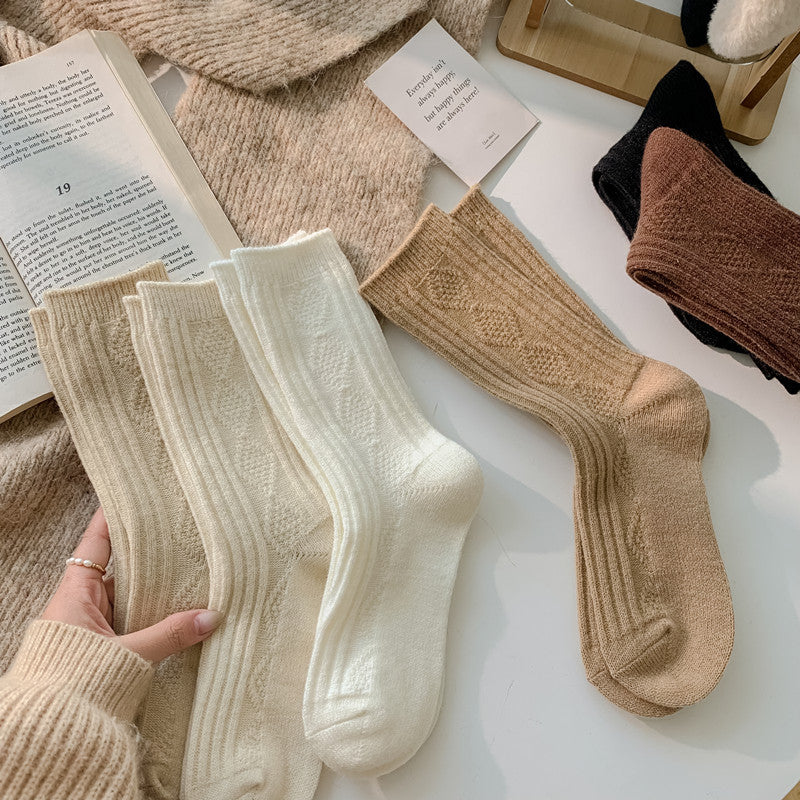 Warm socks made of natural wool with a Pattern Favee.me